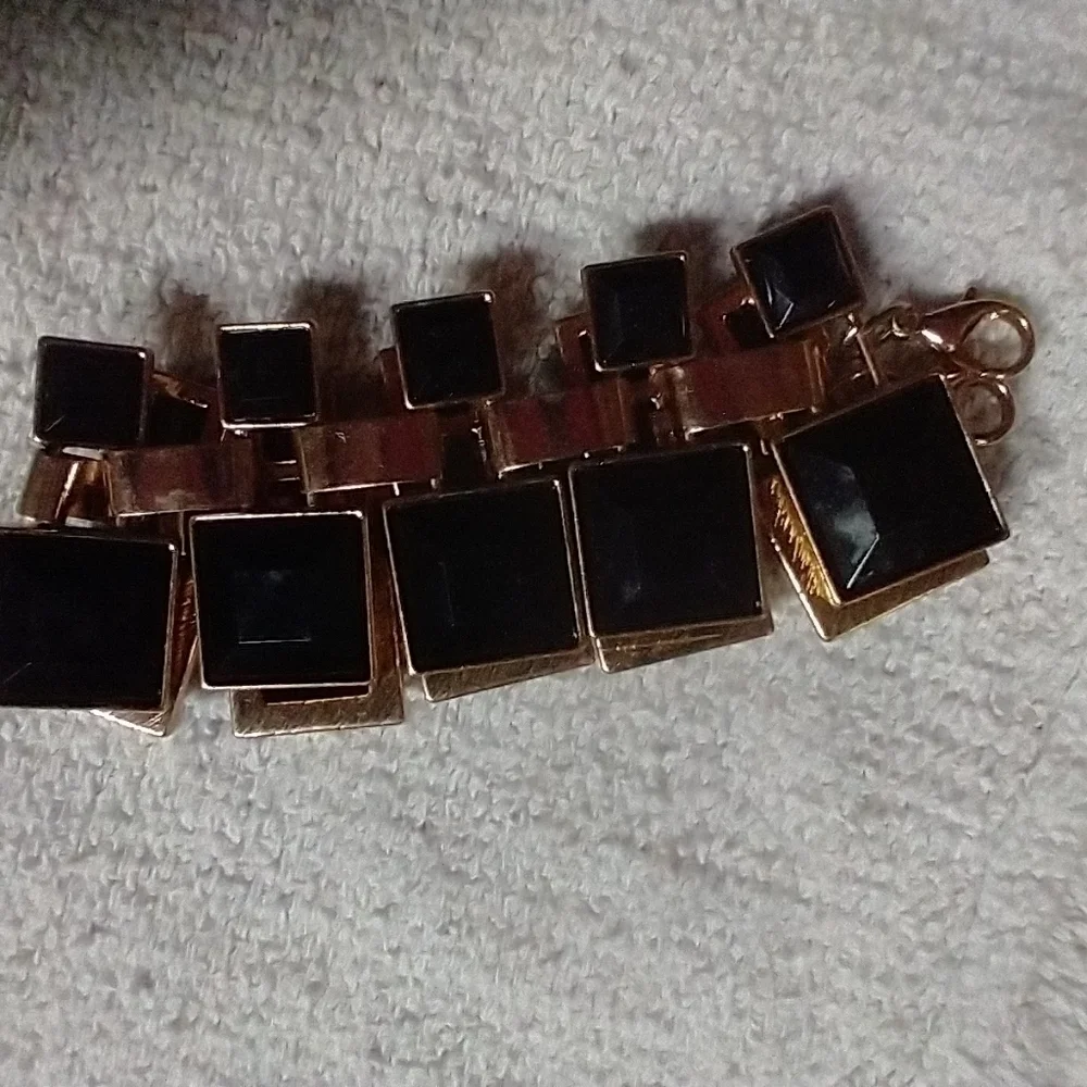 Goldtone black square bracelet